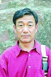 易建荣（李心敏饰演）