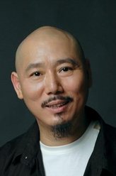 诚　哥（李成儒饰演）